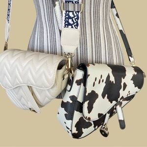 Set of 2 fashion handbags, saddlebag style, both have 2 types of straps